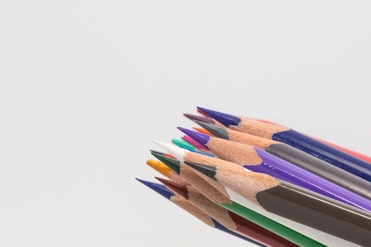 colored pencils wooden pegs pens free photo
