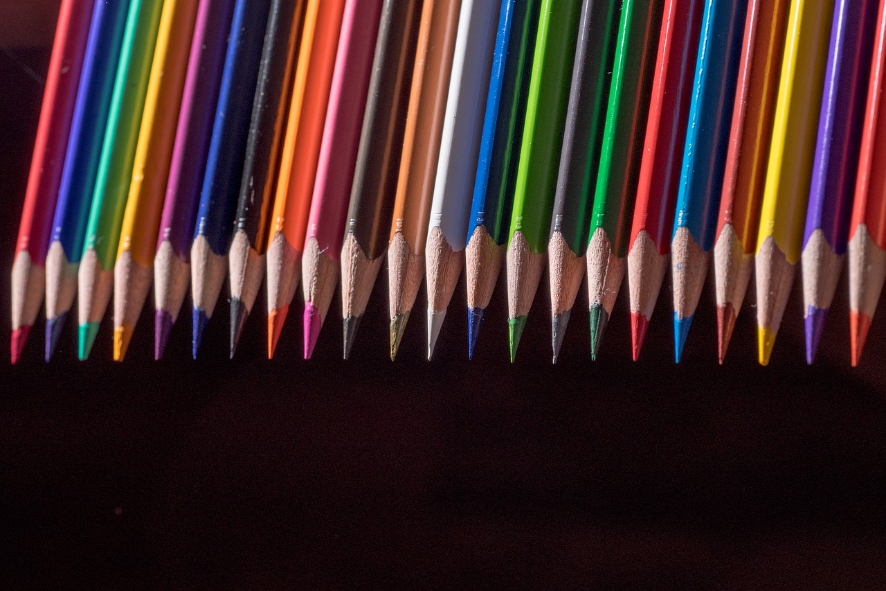 colored pencils wooden pegs pens free photo