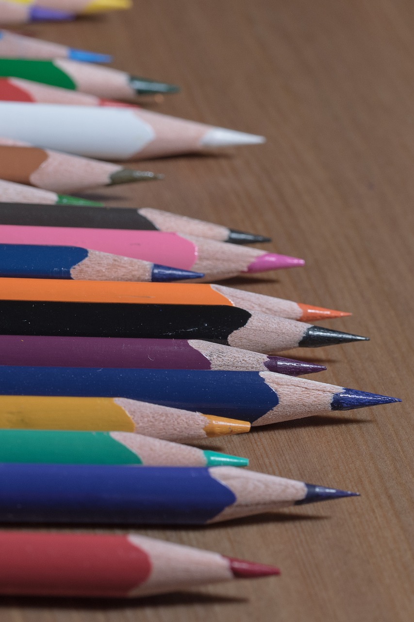 colored pencils wooden pegs pens free photo