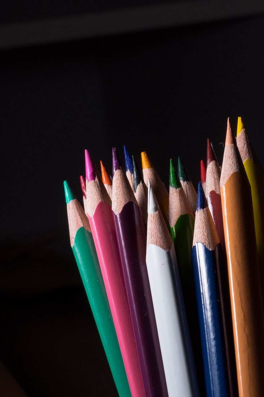 colored pencils wooden pegs pens free photo