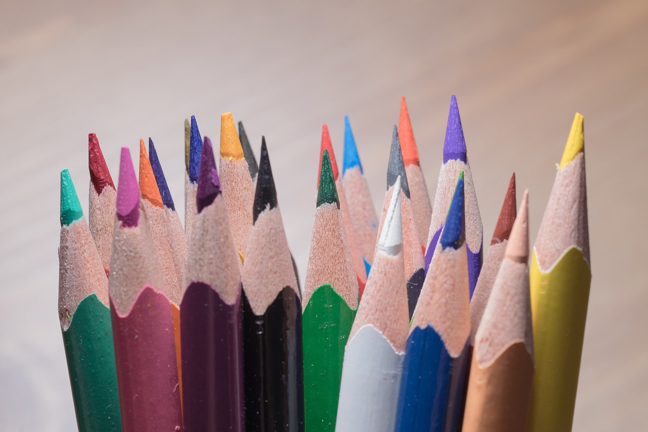 colored pencils wooden pegs pens free photo