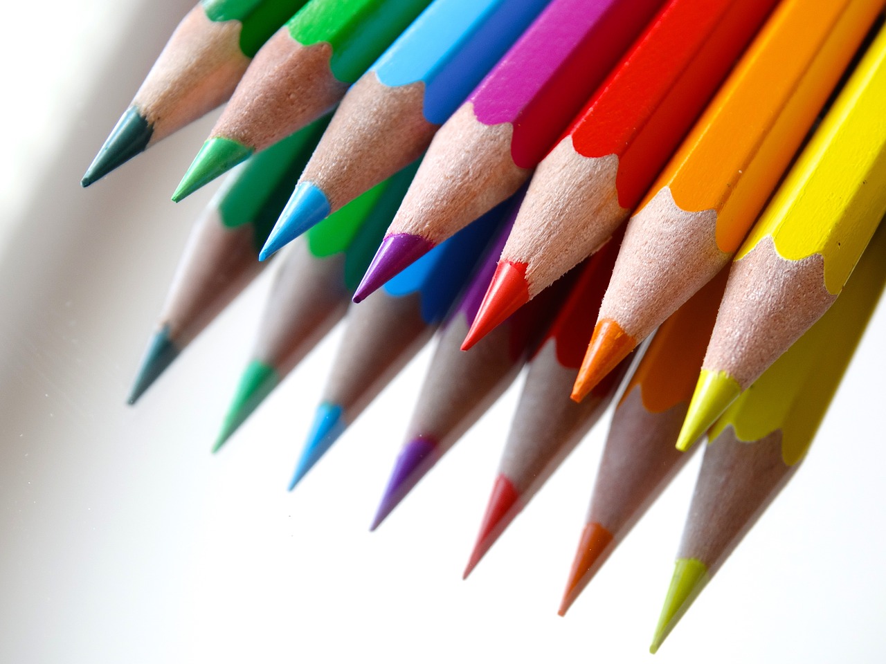 colored pencils colour pencils mirroring free photo