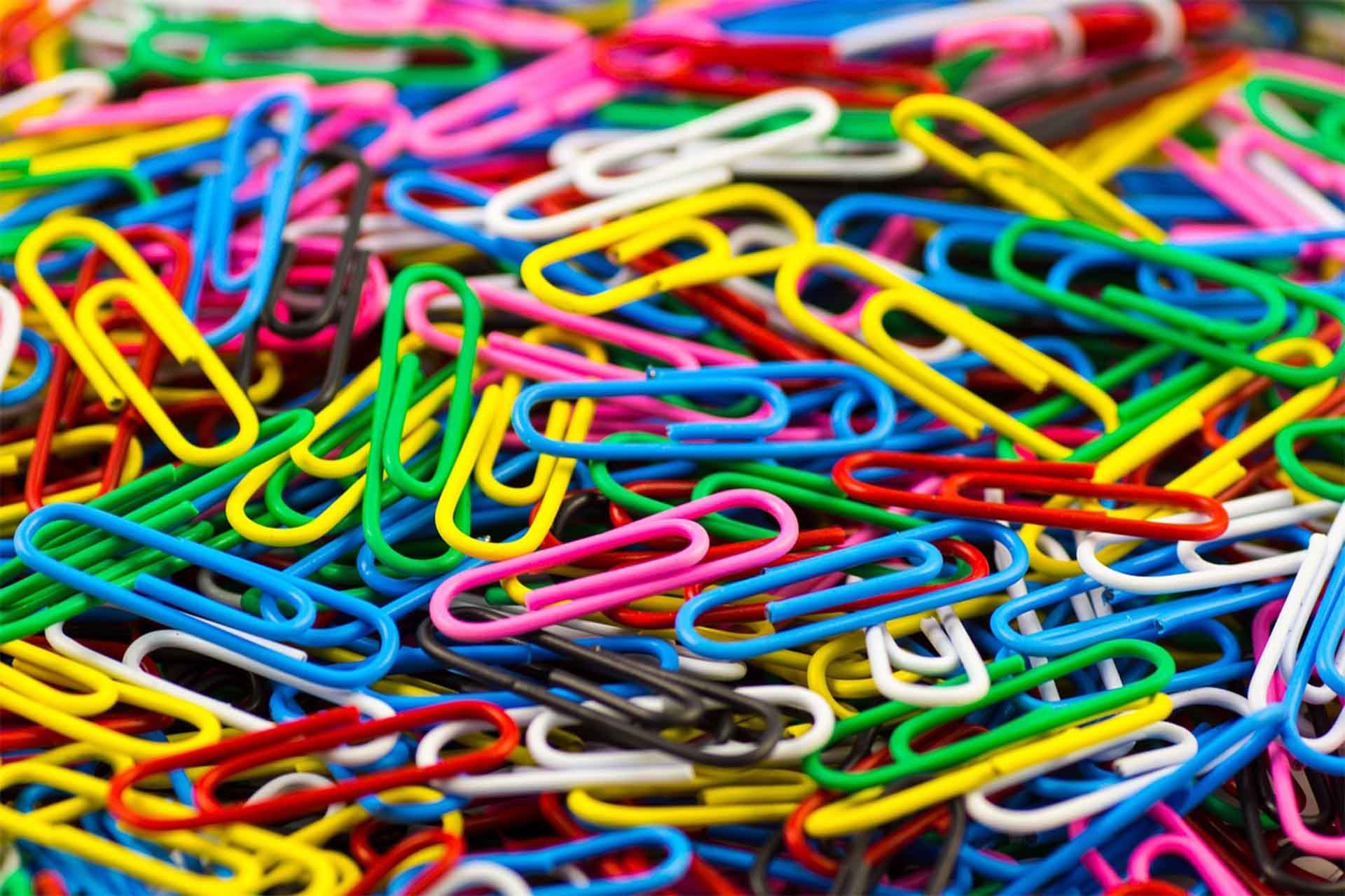 colorful paperclips pile free photo