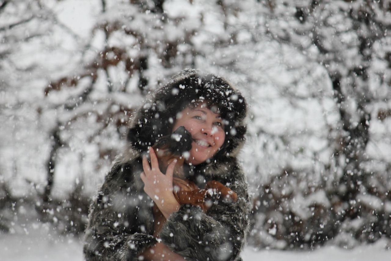 woman dog snow free photo