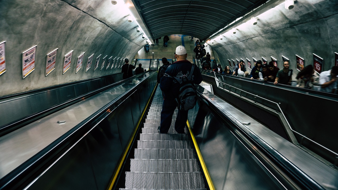 commuter escalator motion free photo