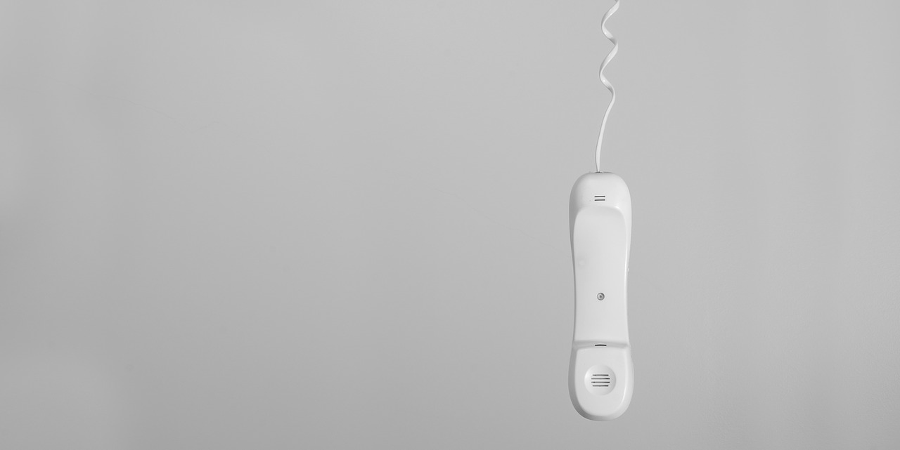 conceptual black and white telephone hanging free photo