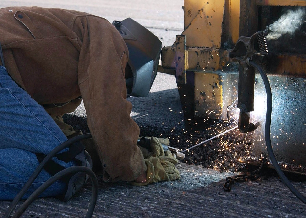 construction worker welding free photo