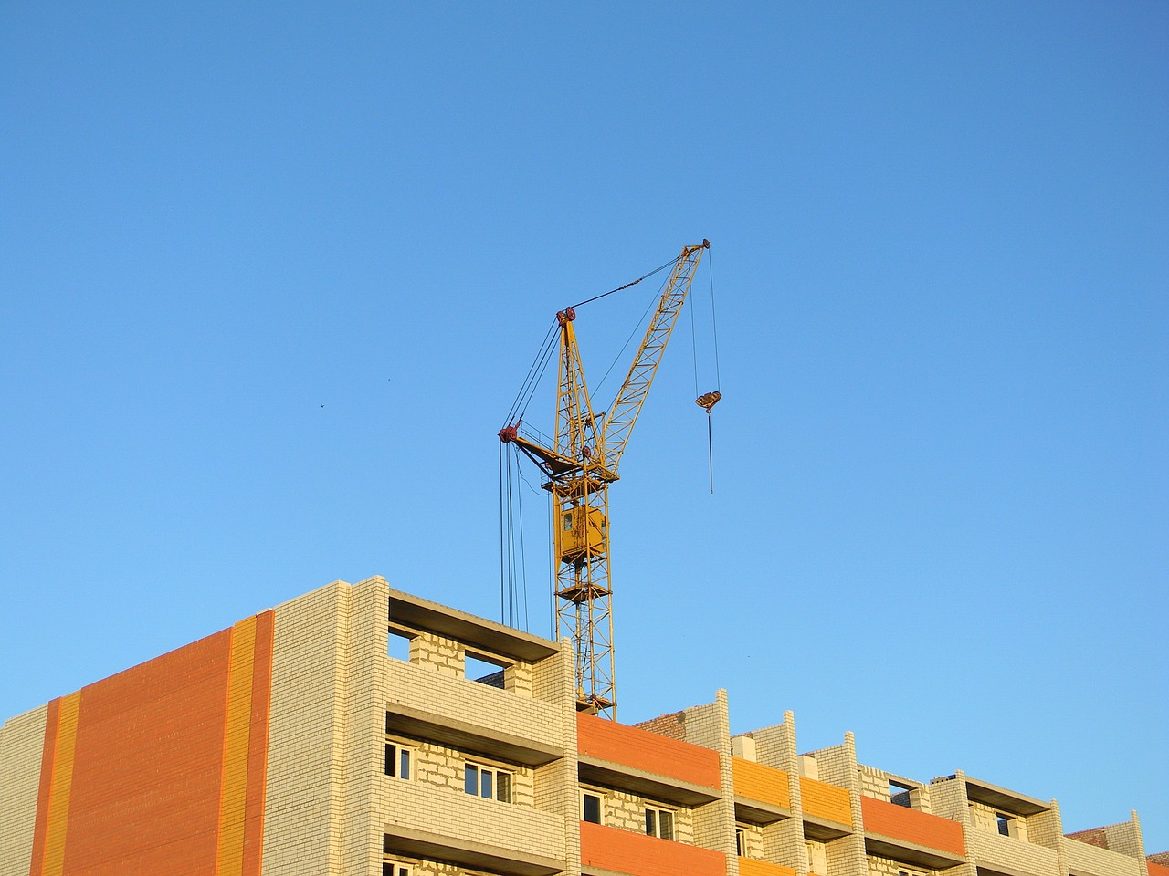 construction crane hoisting jib crane free photo