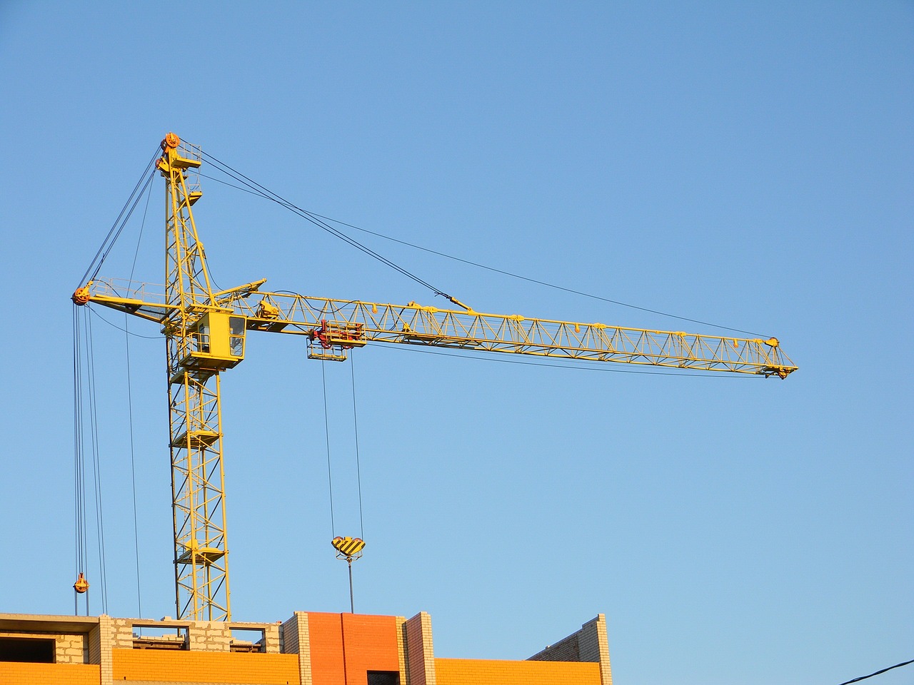construction crane hoisting jib crane free photo
