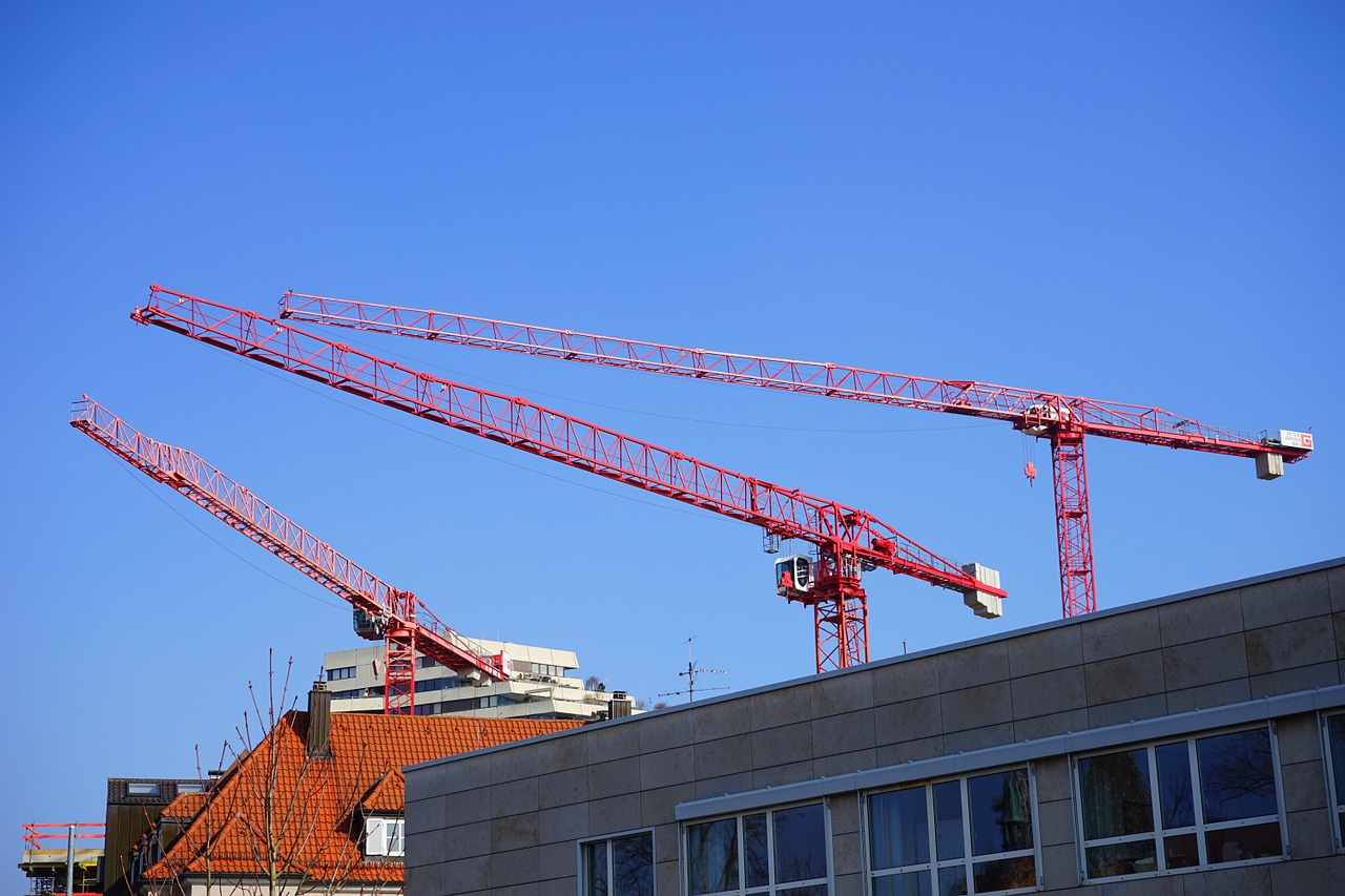 construction cranes cranes site free photo