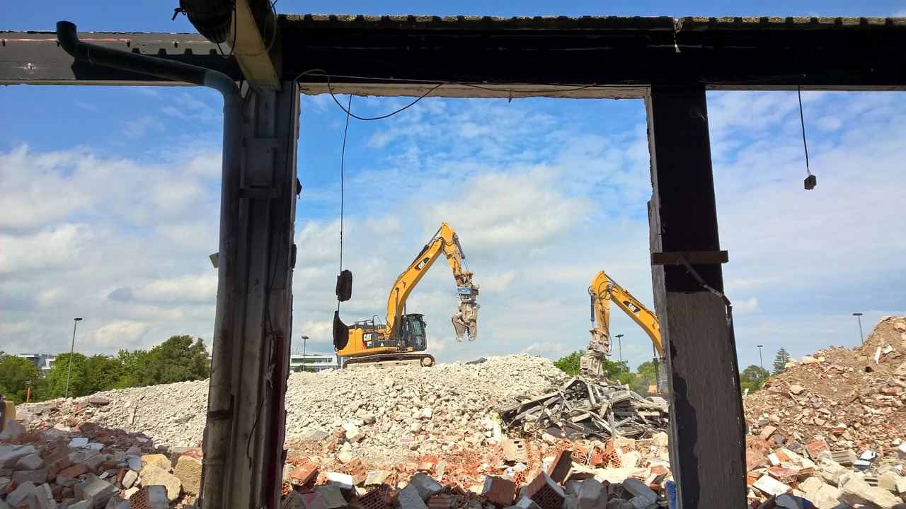 construction machinery demolition building rubble free photo