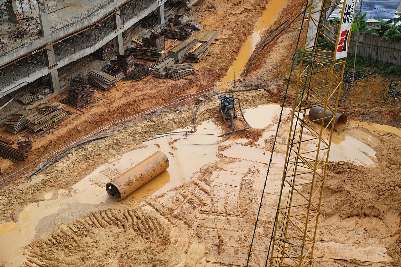 construction site  asian real estate development  muddy ground free photo