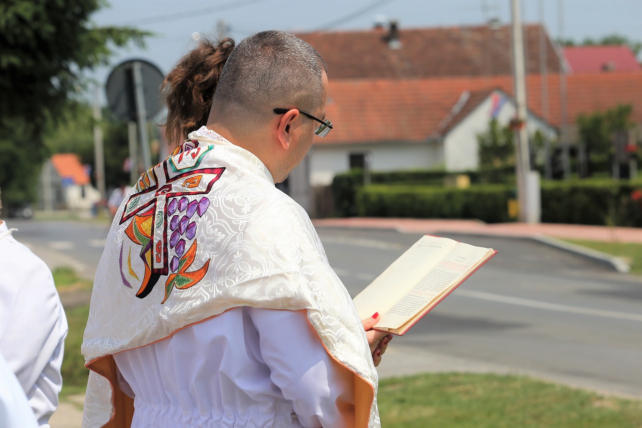 corpus christi feast  priest reading  procession free photo