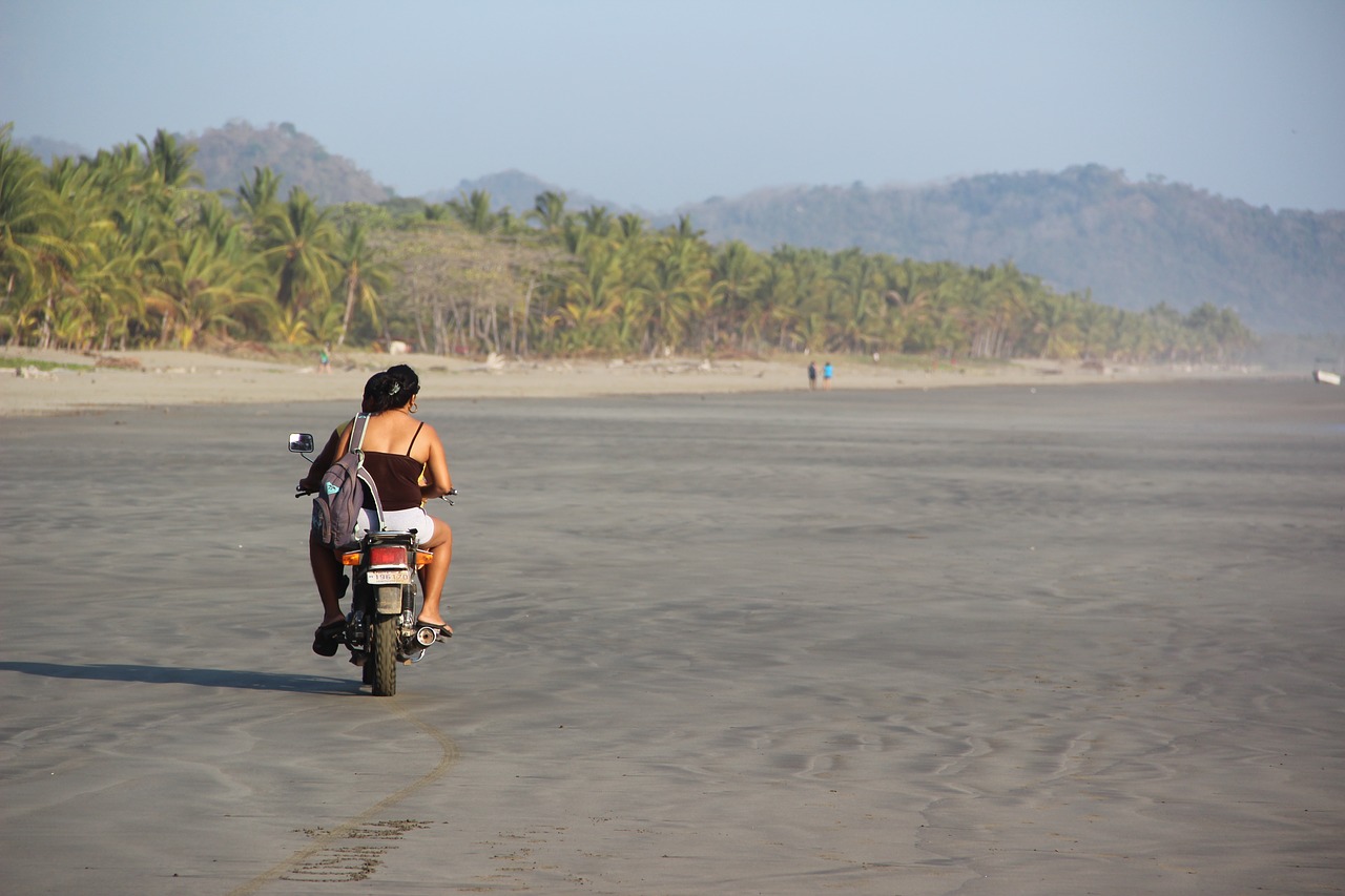 costa rica beach motorcycle free photo