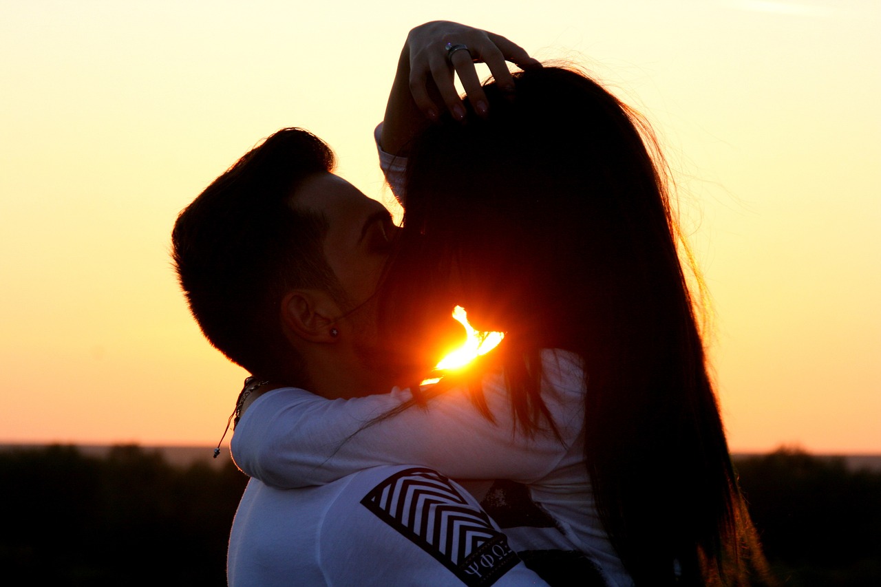 couple love sunset free photo