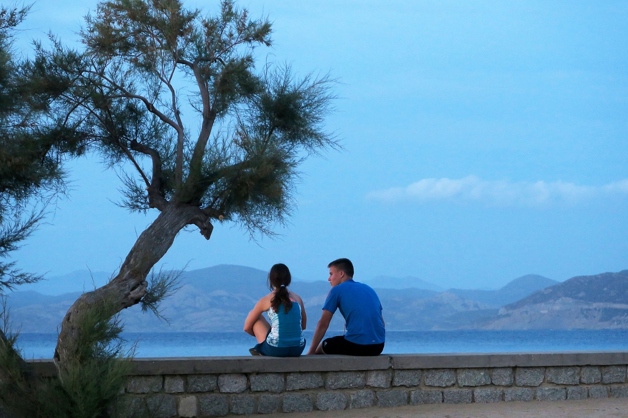 couple seaside young couple free photo