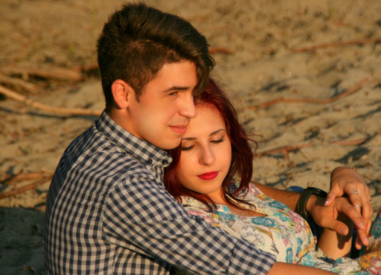 couple love beach free photo