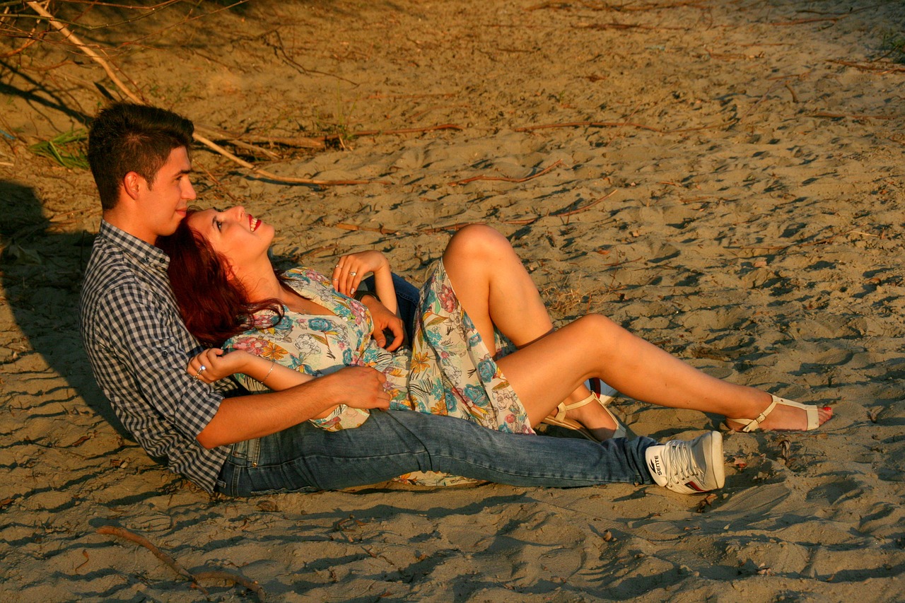 couple love beach free photo