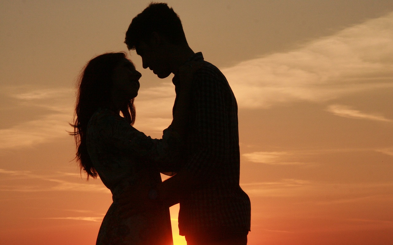 couple love sunset free photo