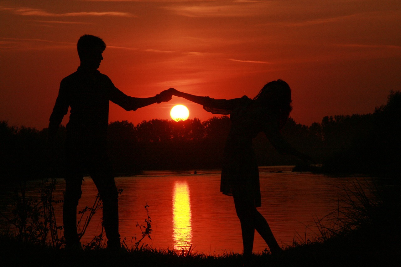 couple love sunset free photo