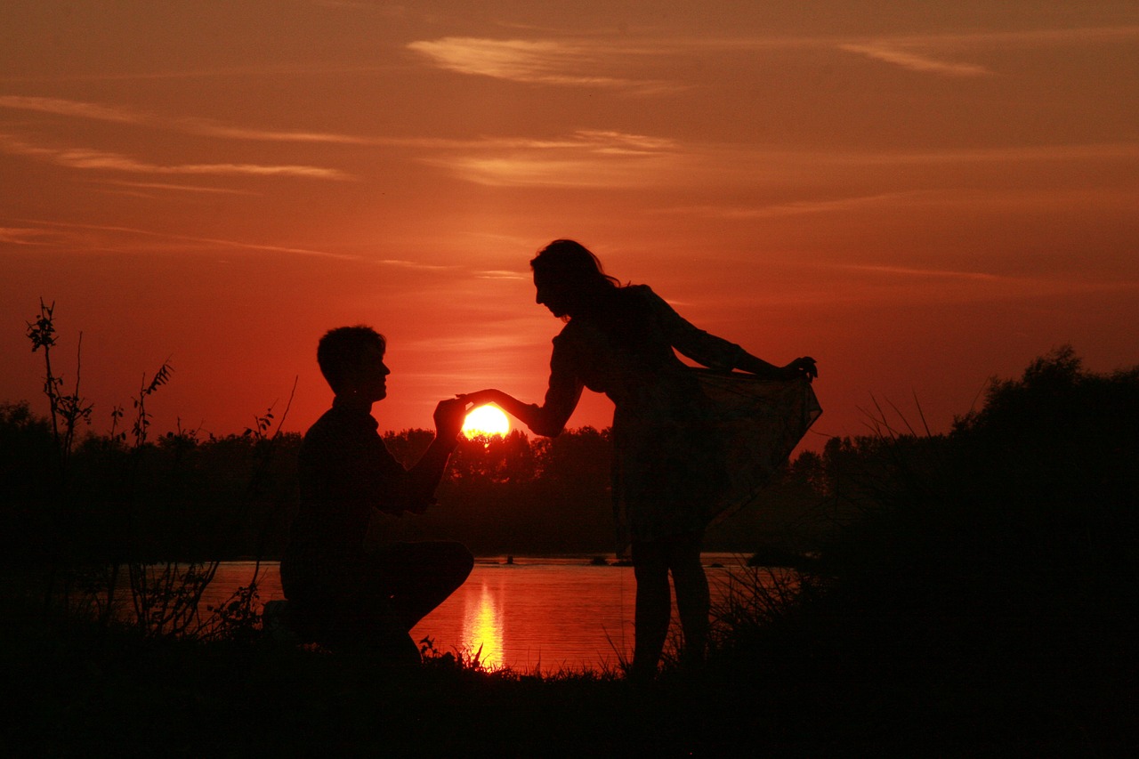 couple love sunset free photo