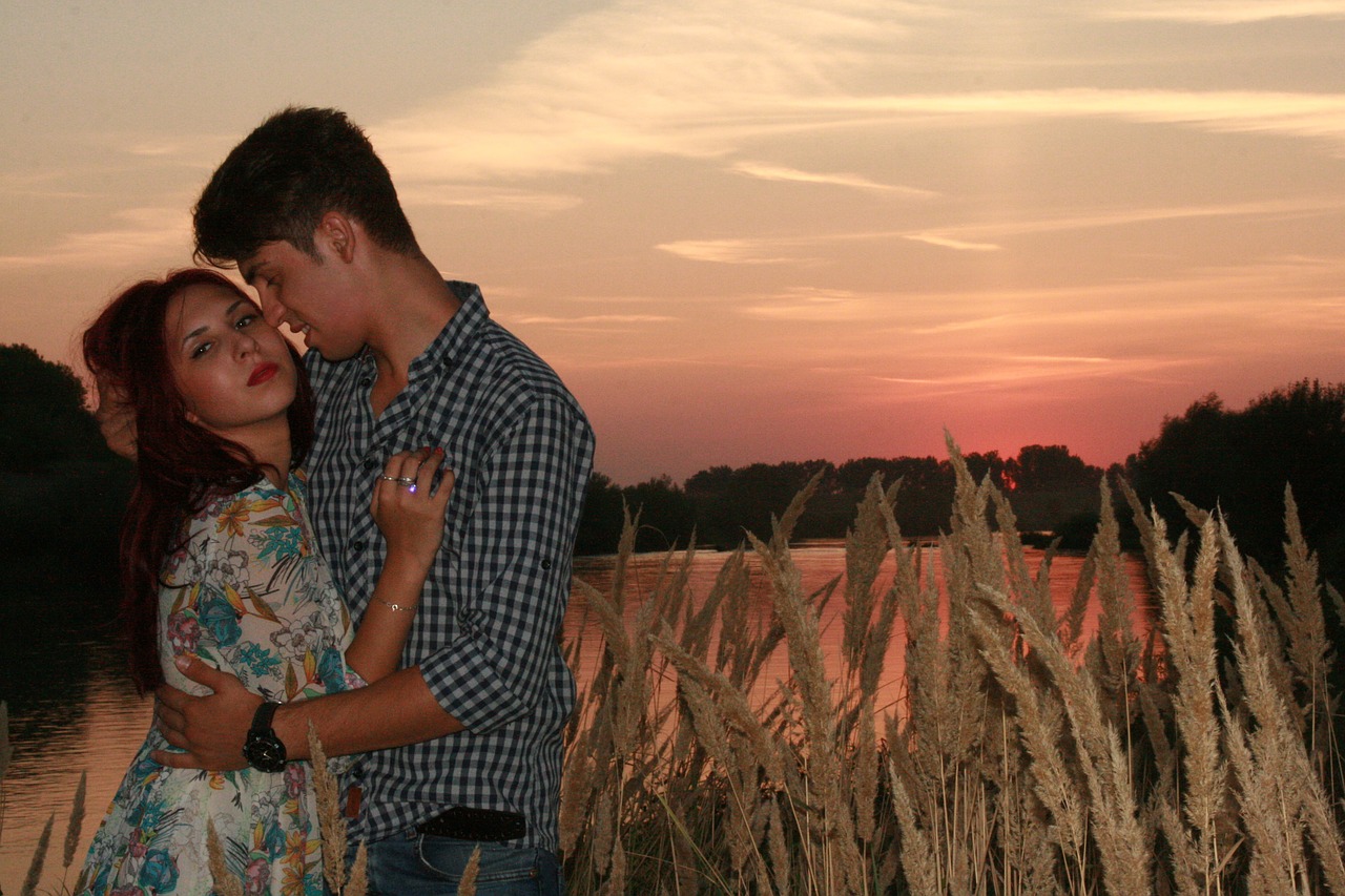 couple love sunset free photo