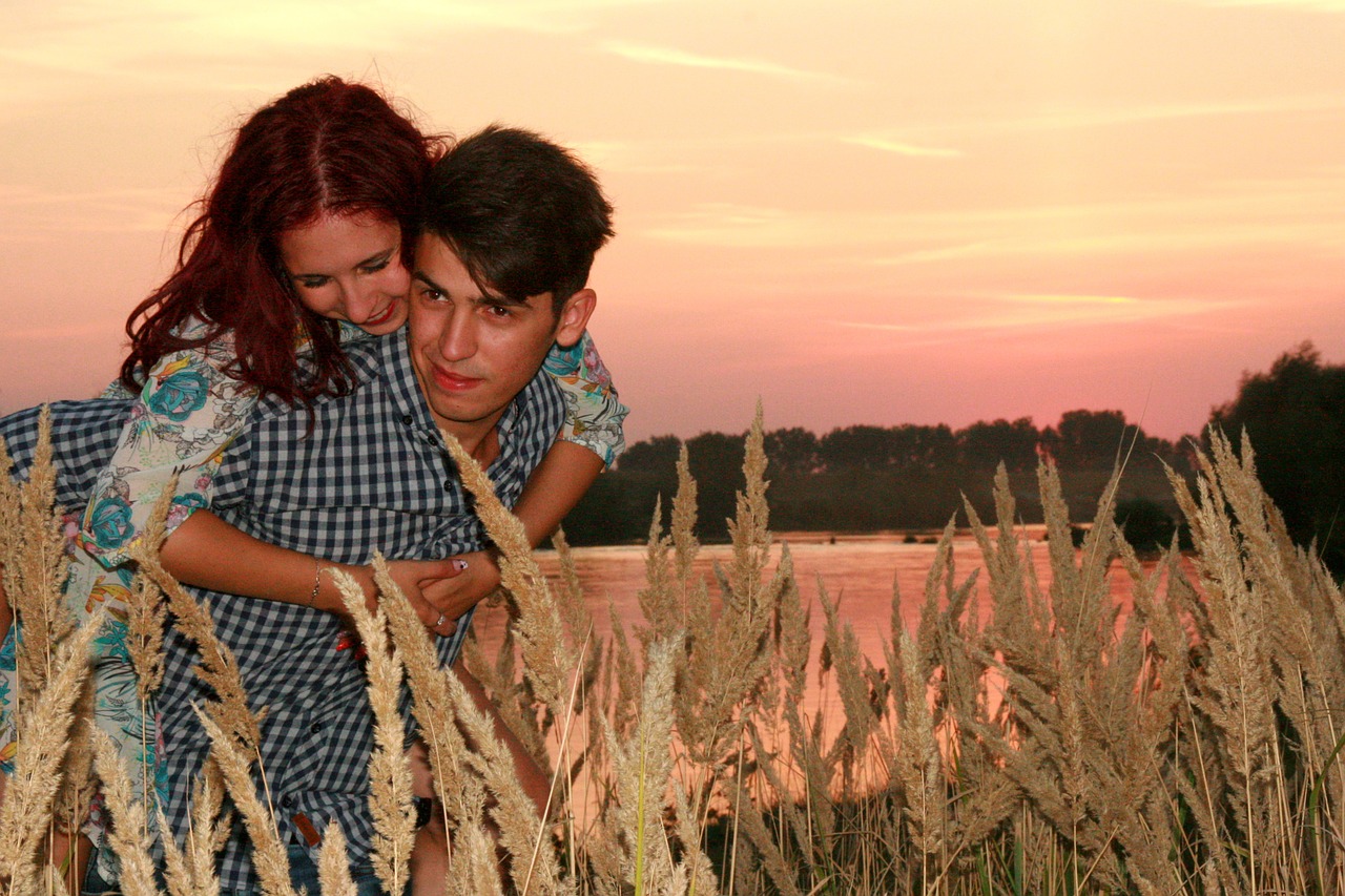 couple love sunset free photo