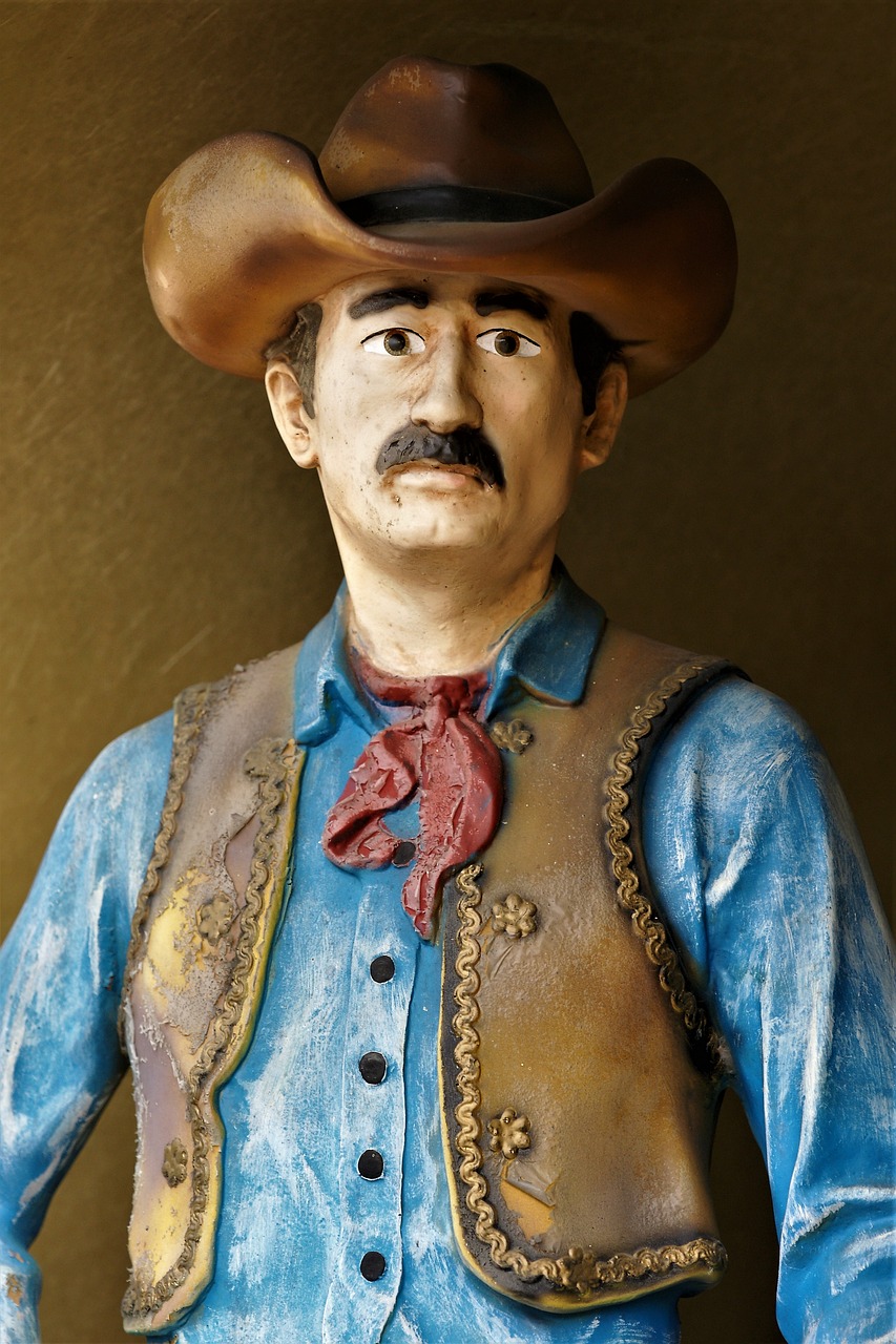 cowboy sculpture art free photo