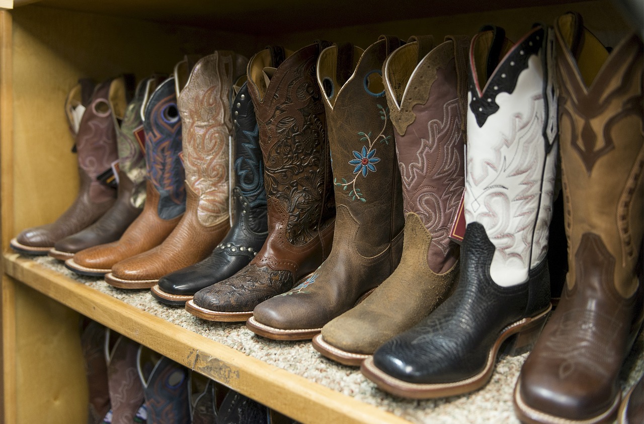 cowboy boots  shelves  styles free photo
