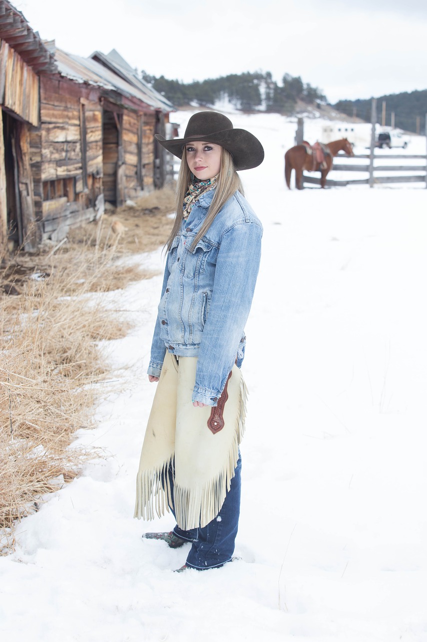 cowgirl  dog  snow free photo