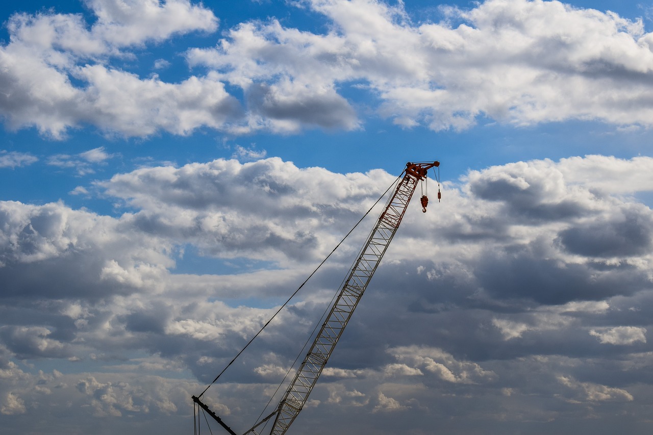 crane sky clouds free photo