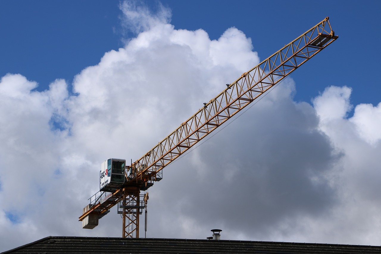 crane  sky  clouds free photo