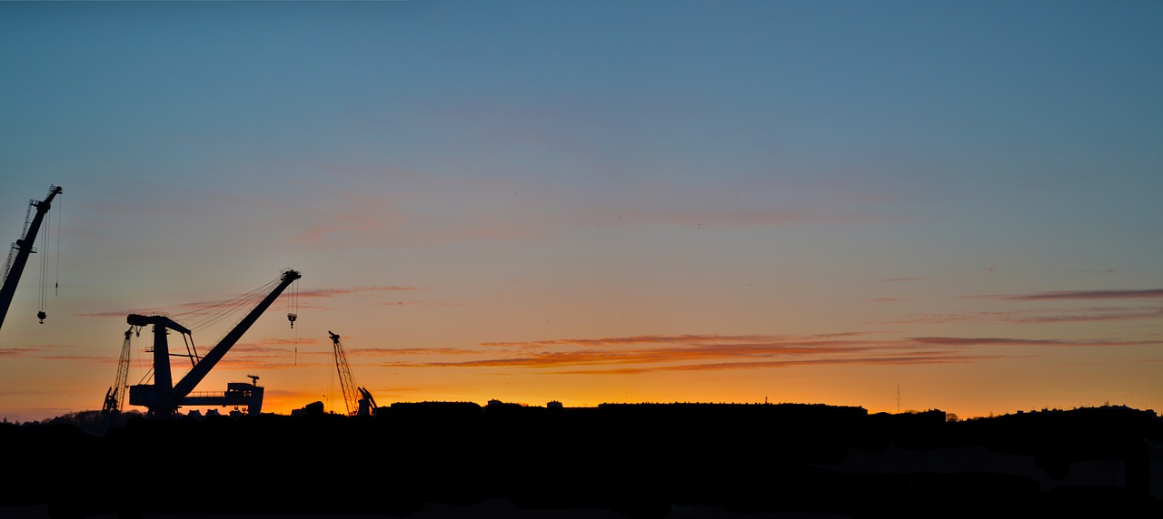 crane sunset sky free photo