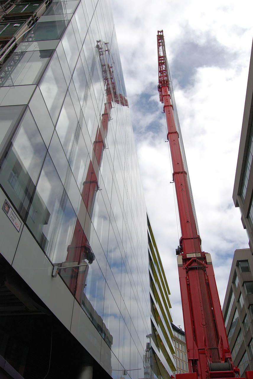 crane building reflection free photo