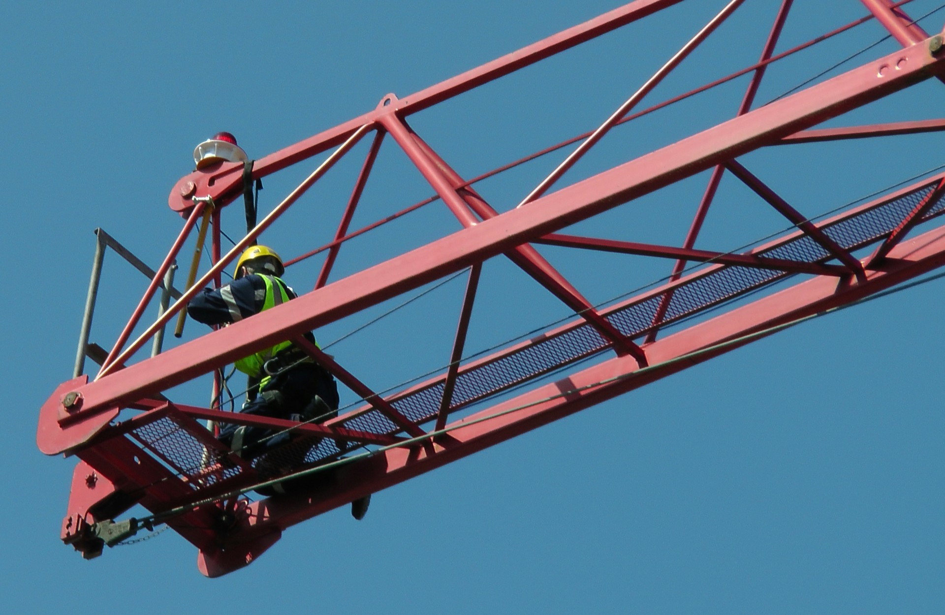 construction building site crane crane operator checking cables crane hook free photo