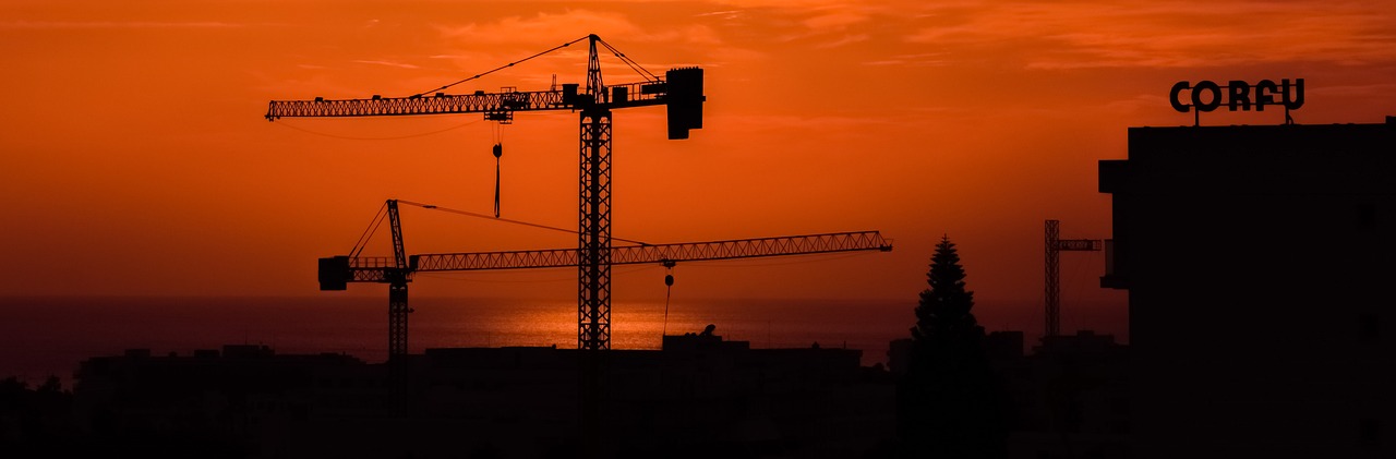 cranes sunset construction free photo