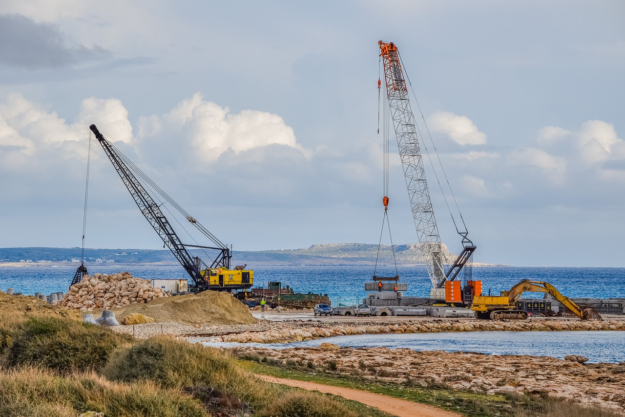 cranes construction working free photo