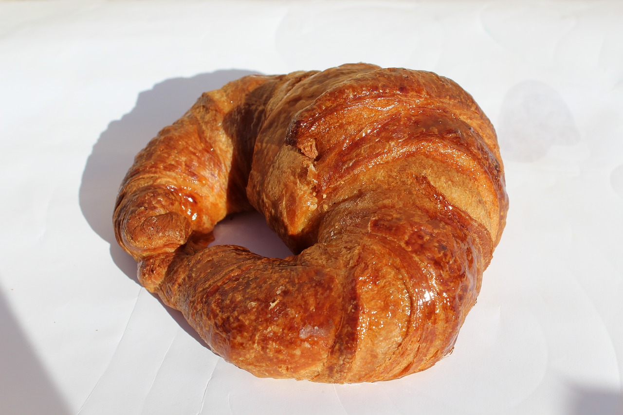croissant pastry shiny food free photo