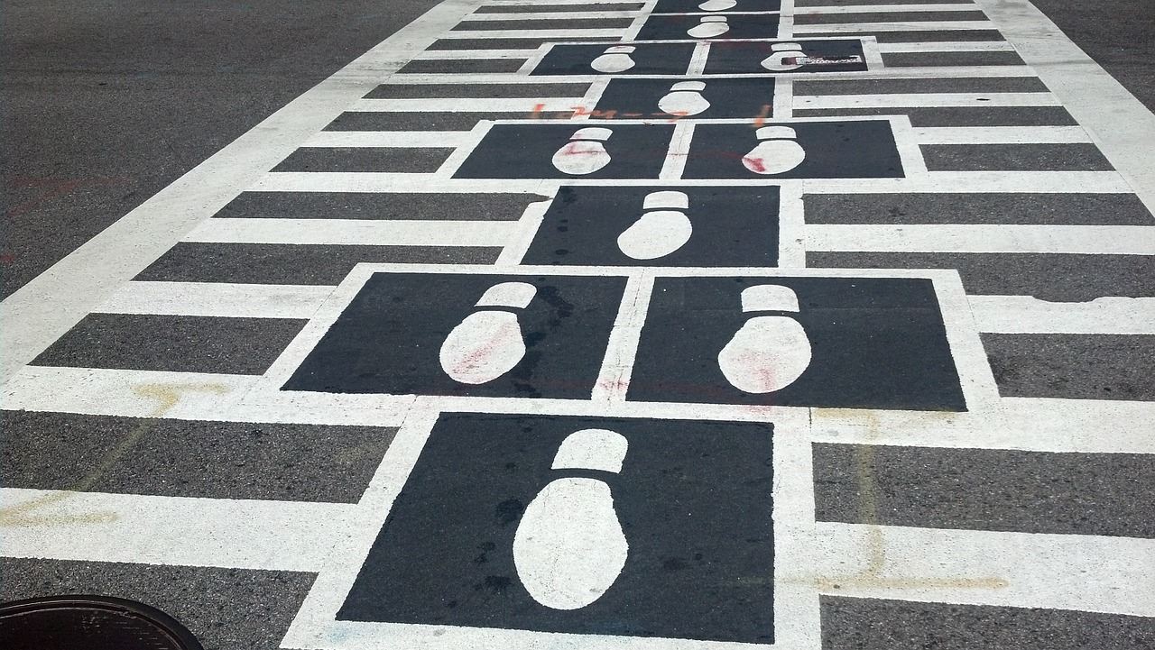 crosswalk footprints pedestrian free photo