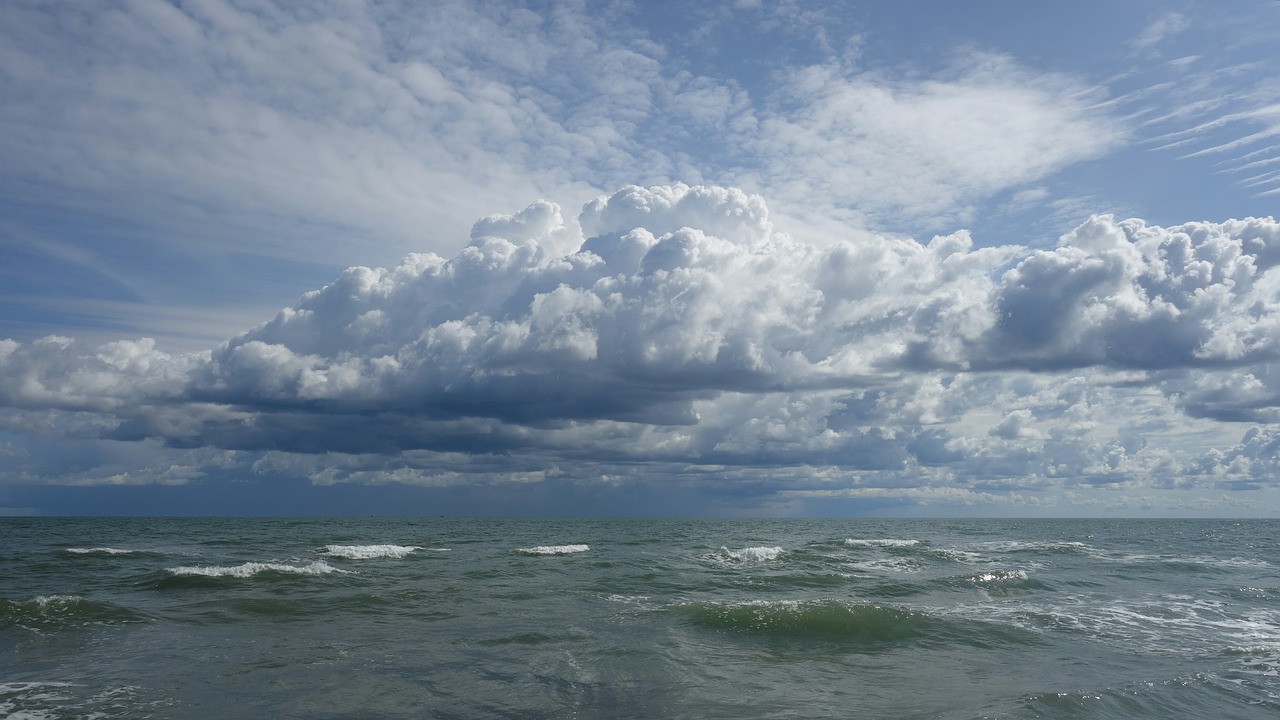 cumulus clouds sea wind free photo