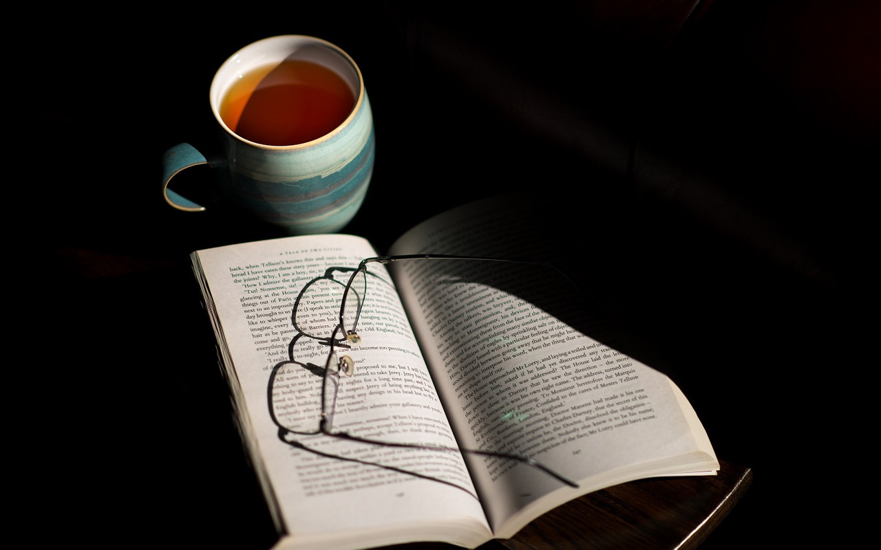 cup of tea book table free photo