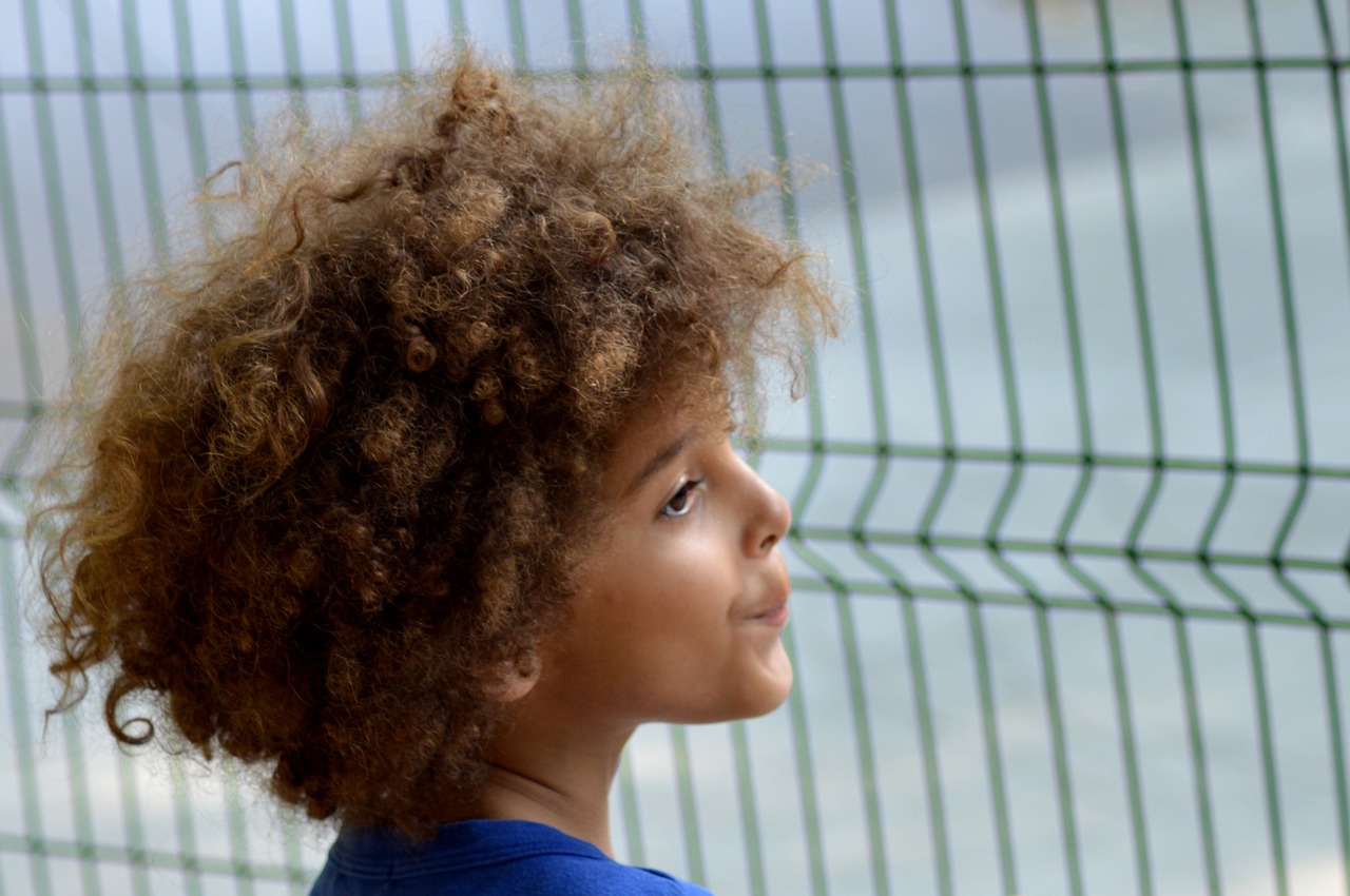 curly boy red-haired boy free photo