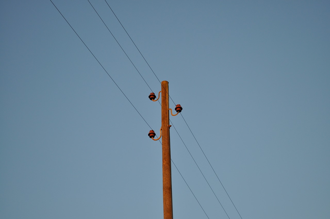 current  telephone pole  power line free photo