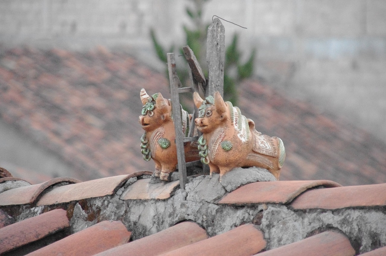 cusco peru inca ornaments roof tops free photo