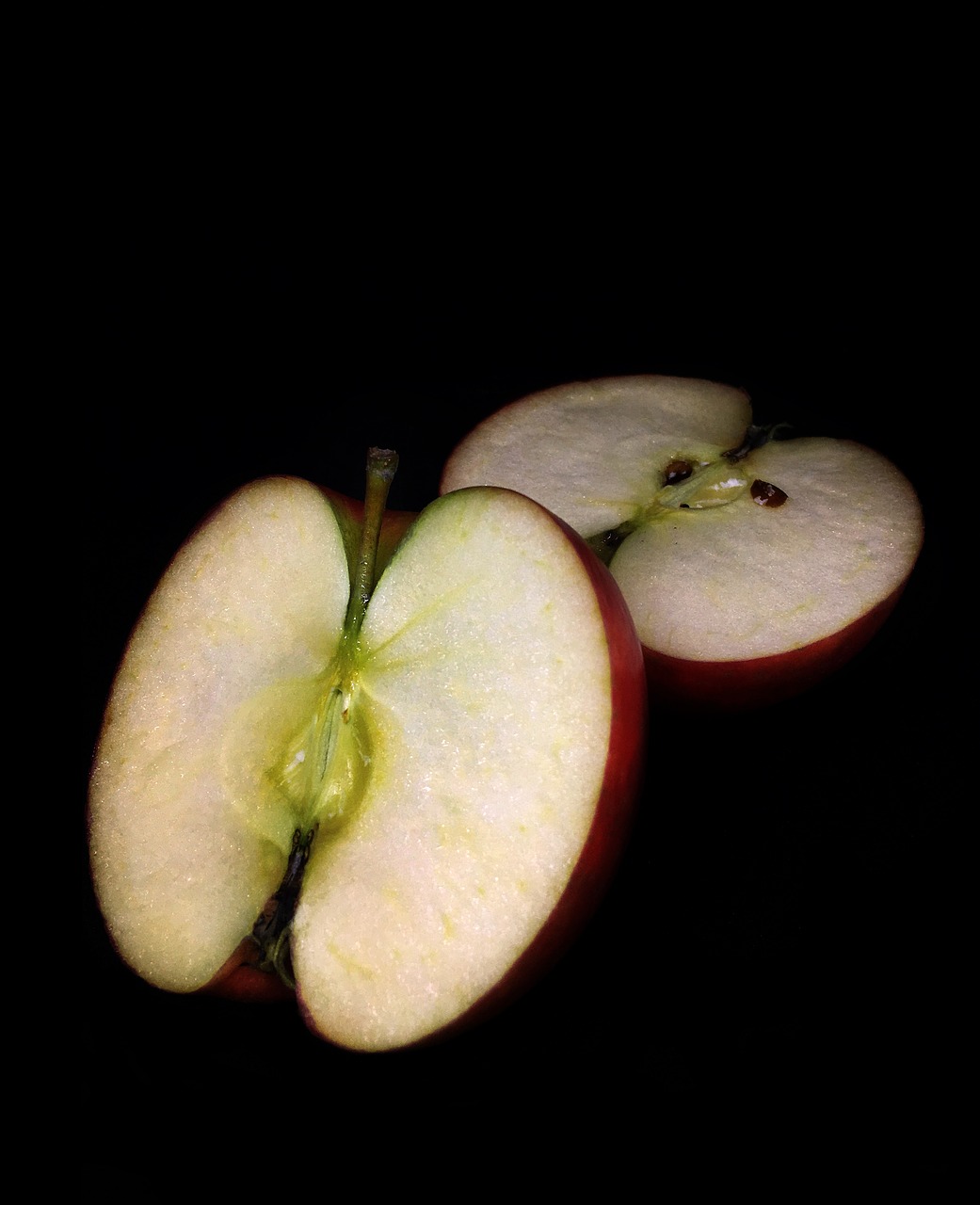 cut apple apple black background free photo
