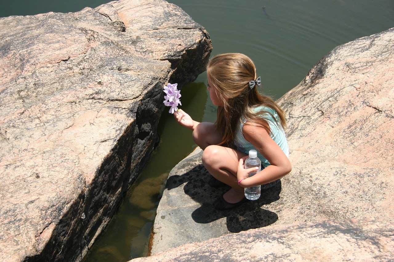 girl flower shore free photo