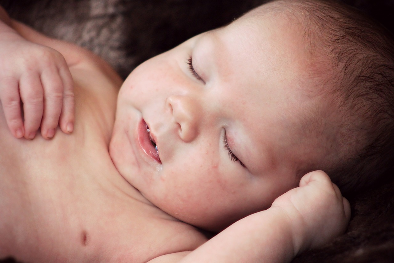 cute baby asleep free photo