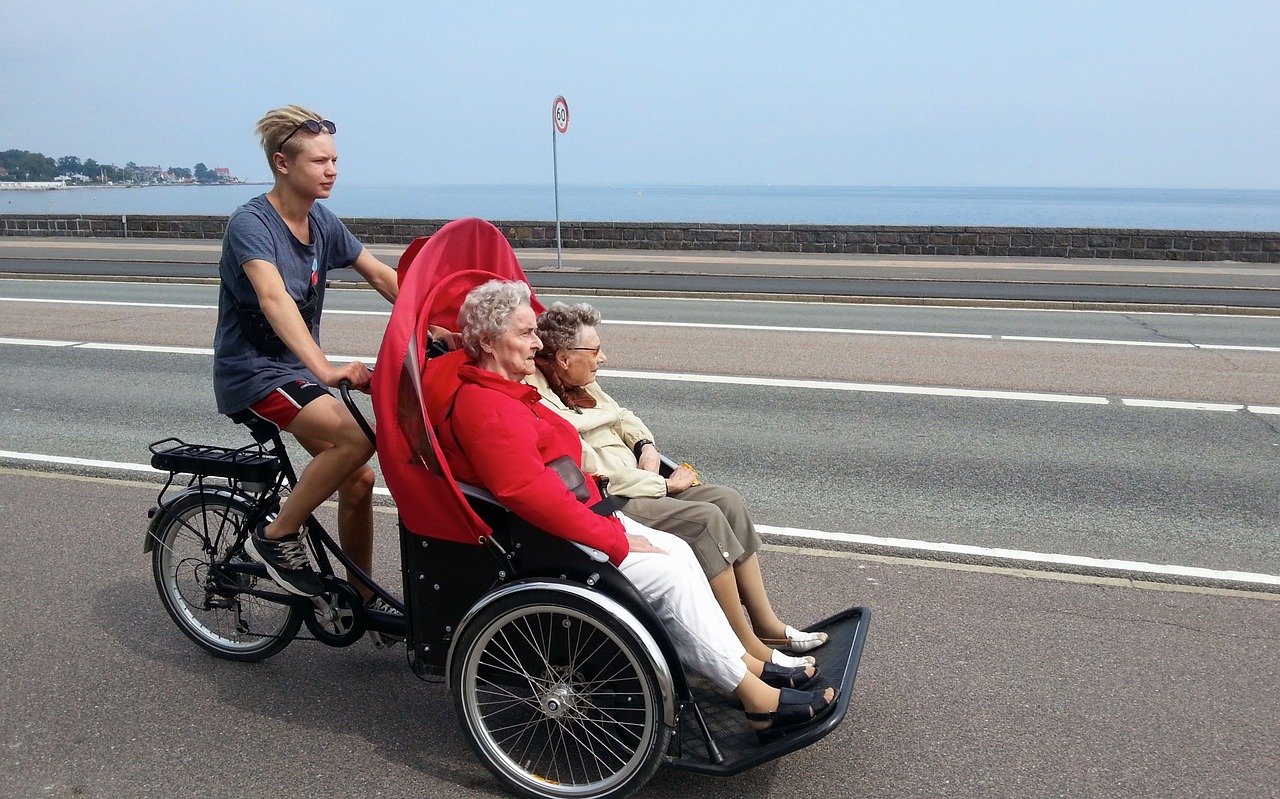 cycling without age bicycle taxi wind in the hair free photo