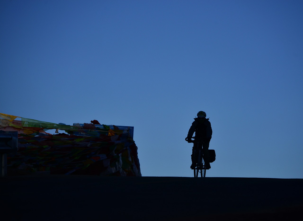 cyclist at dusk bike free photo