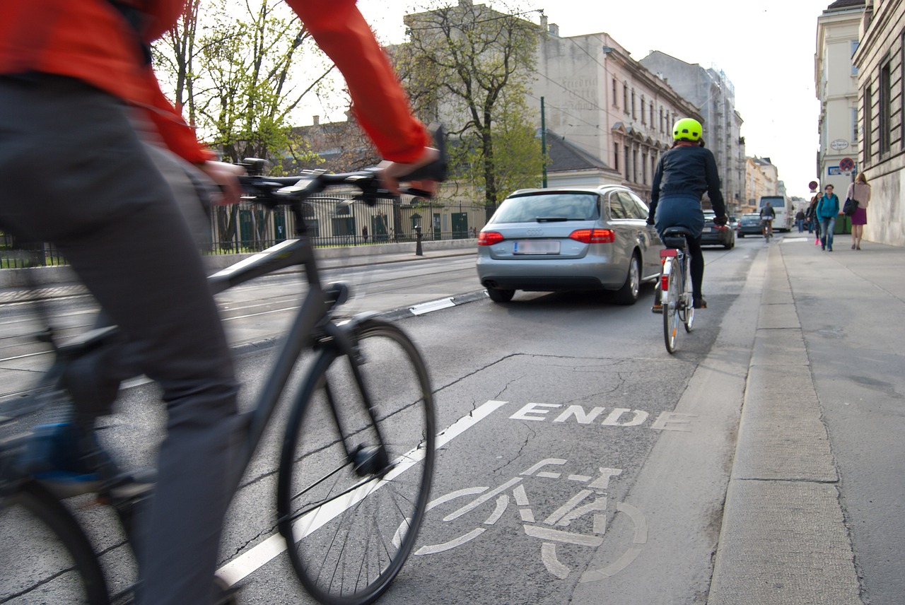 cyclists cycle path traffic free photo